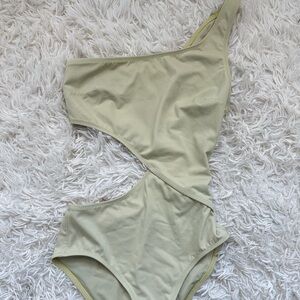 One piece bathing suit cut out